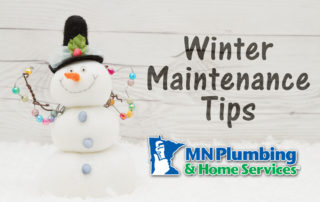 Snowman decorated with MN Plumbing and Home Services logo