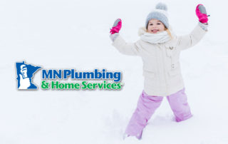 young girl playing in the snow